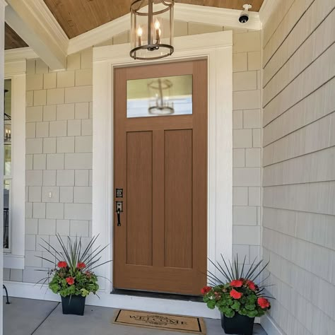 Are you drawn to the clean lines, minimalist aesthetic, and versatility of the “Shaker” style? So are we! Doors from our Craftsman series offer Shaker profiles in Fir and Smooth skins for homeowners who love this timeless style. Check them out! Exterior Doors Craftsman, Natural Wood Front Door Farmhouse, Craftsman Exterior Doors, Shaker Style Exterior Door, Craftsman Doors Exterior Front Entry, Shaker Style Front Door, Front Entry Doors With Sidelights, Shaker Front Door, Exterior Kitchen Doors