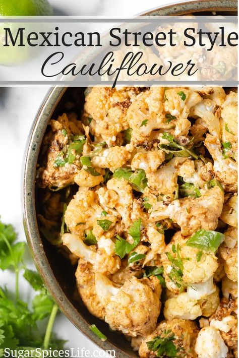 Cripsy, roasted cauliflower coated in a flavorful, creamy sauce, then tossed with crumbled Queso, green onions, and cilantro. This Mexican Street Style Cauliflower is an easy and delicious side or appetizer! Tajin Cauliflower, Mexican Roasted Cauliflower, Mexican Street Corn Cauliflower, Cauliflower Street Corn, Green Cauliflower Recipes, Mexican Veggie Side Dish, Mexican Street Cauliflower, Mexican Street Style, Mexican Vegetables