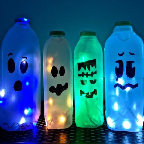 Different-designs-of-light-up-milk-cartons Cheap Easy Halloween Decorations, Milk Bottle Craft, Halloween Lights Diy, Glow Bottle, Milk Carton Crafts, Simple Halloween Decor, Spilt Milk, Glow Halloween, Halloween Entertaining