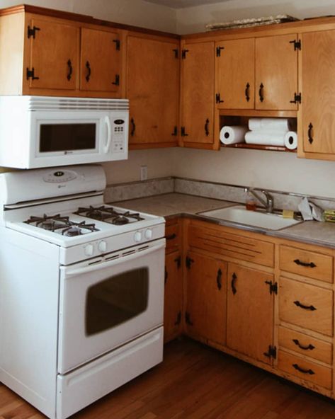 Painting Kitchen Cabinets - Budget Remodel Before After | Apartment Therapy How To Clean Old Kitchen Cabinets, Knotty Pine Cabinets Makeover, Pine Cabinets Kitchen Makeover, 1960 Kitchen Cabinets, Knotty Pine Kitchen Cabinets Makeover, Pine Kitchen Cabinets Makeover, Painting Old Kitchen Cabinets, 60s Kitchen Remodel, 1960s Kitchen Cabinets