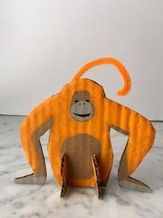 DIY Cardboard orangutan made from recycled boxes! Easy to use templates! Cardboard Crafts For Kids, Diy Cardboard Crafts, Lemonade Stand Sign, Animals Craft, Cardboard Animals, Monkey Crafts, Animal Templates, Trendy Diy, Animal Crafts For Kids