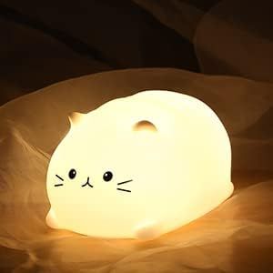 "Cat Night Light with long-life battery and soft silicone material. Soft brightness and 7 color changes. Adorable whale design. Perfect for kids' bedrooms."#CatNightLight #KidsNightLight #NurseryLamp #LEDNightLight #SoftBrightness #BreathingColor #BabyNightLight #WhaleDesign #BedtimeEase #DiaperChanging #Breastfeeding #AdorableDesign Ducks And Frogs, Computer Room Ideas, Cat Themed Bedroom, Cat Nightlight, Dream Desk Setup, Cutesy Aesthetic, Camping Bedroom, Nightlight Lamp, Shared Bedroom Ideas