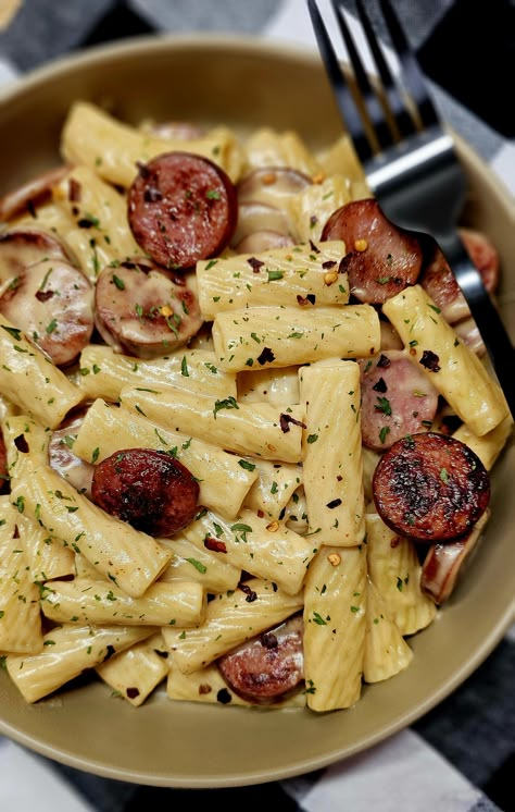 Smoked Sausage & Mozzarella Pasta - A very simple weeknight supper loaded with smoked sausage, rigatoni pasta and a creamy mozzarella sauce. Easy Dinner Smoked Sausage, Noodle Sausage Recipe, Dinner Recipes With Sausage Links, One Pot Kielbasa Recipes, Brat Pasta Recipe, Pasta And Kielbasa Recipes, Horseshoe Sausage Recipes, Dinners With Smoked Sausage, Healthy Affordable Dinners