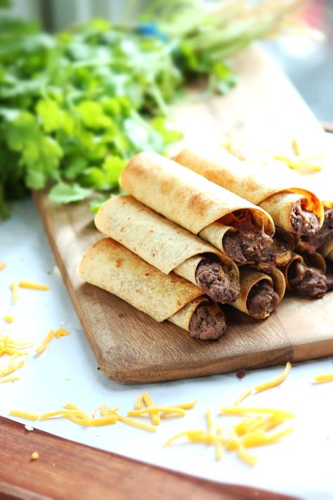 Baked Black Bean and Cheese Taquitos - ready in under 30 minutes and only 108 calories and 3 WW points each! Bean And Cheese Taquitos, Orzo With Roasted Vegetables, Corn Black Bean Salad, Black Bean Taquitos, Bean Taquitos, Cheese Taquitos, Corn Black Bean, Watermelon Margaritas, Mango Sauce