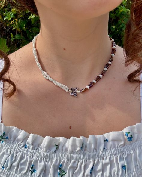 🧚🏻‍♀️Half Pearl White & Half Brown Beaded Necklace, Dainty Choker Necklace with Butterfly Charm🤍🦋🤎 ✨Link in bio ✨Price of the necklace: 25 cad #daphnedragonflyjewellery #beads #beadednecklace #beadedjewelry #necklace #daintynecklace #fairy #fairyjewelry #jewellery #daintyjewelry #seedbeads #handmadejewelry #handmade #beautiful #style Brown Beaded Necklace, Dainty Choker Necklace, Dainty Choker, Fairy Jewelry, Beautiful Style, Butterfly Charm, Necklace Dainty, Dainty Jewelry, Dainty Necklace