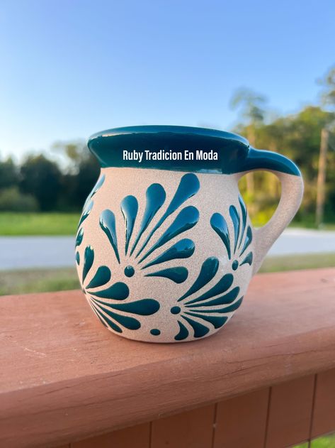 This Mexican Clay Mug/ Clay Cups/ Jarritos Mexicanos/ Tazas Artesanales/ Artesanias Mexicanas is a beautiful addition to your kitchenware collection. Handcrafted with traditional style, these mugs feature a lovely floral pattern that is sure to catch the eye. Made from high-quality ceramic material, these mugs are durable and heat resistant. You can enjoy your hot beverages without worrying about any damage to the mug. Not only are these mugs functional, but they are also non-customised and perf Ceramic Painting Patterns, Coil Pot Ceramics, Mexican Cups, Mexican Inspired Ceramics, Spanish Pottery, Mexican Coffee Cups, Mexican Mug, Mexican Mugs, Mexican Jarritos Painted