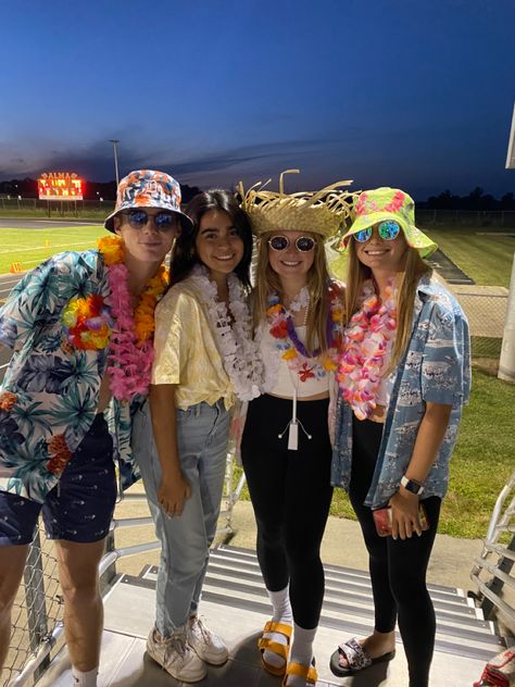 high school senior student section aesthetic hawaiian theme night friday night lights Hawaiian Game Day Outfit, Beach Theme Dance Outfit, Hawian Day School Outfits, Hawaiian Theme Outfit For School, Aloha Theme Outfit, Beach Day Dress Up Ideas For School, Hawaiian Fnl Theme, Beach Out Football Theme, Surfer Costume Spirit Week