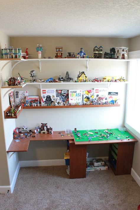 the next generation of lego table and storage Lego Corner Shelf, Lego Setup, Toy Display Ideas, Lego Corner, Diy Lego Wall, Lego Shelves, Lego Tables, Lego Room Ideas, Lego Display Ideas