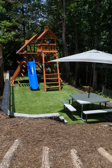 Wouldn't your kids enjoy having this playground in the backyard? l backyard l playground l fake grass l artificial turf l go green l Playground With Turf, Turf Play Area Backyard, Turf Playground Backyard, Turf Play Area, Swingset Landscaping, Infant Playground, Artificial Turf Backyard, Playground Turf, Back Garden Landscaping