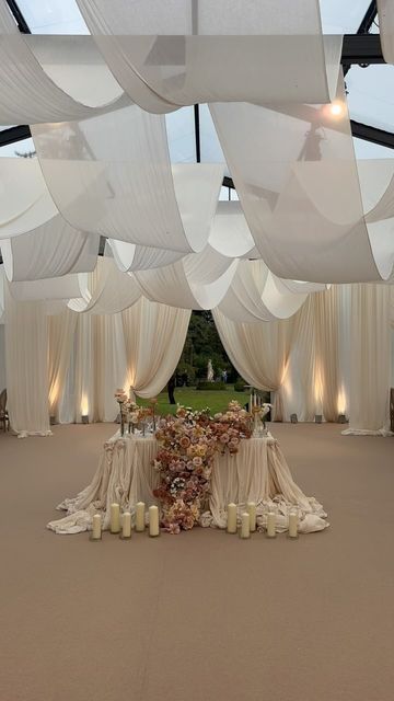 Mia Sylvia Herrod on Instagram: "Tucked away, north of Milan we wrapped Elvezia + Stefano in a soft cocoon of romance, textures and magic ✨  A wildly dreamy top table. Designed in our signature style with the talented @riccardociceri 🌸  Glorious team 💪 couple ✨ @stefanocolicchio @_elvezia_  planner + event director @silviaslitti  textile artist @miasylviaa flowers @riccardociceri  production service @blunotteventi  catering @federicosalzacatering" Event Director, Prewedding Shoot, 2025 Trends, Wedding Concept, Wedding Backdrops, Wedding Stage Decorations, Textile Artist, Wedding Vibes, Stage Decorations