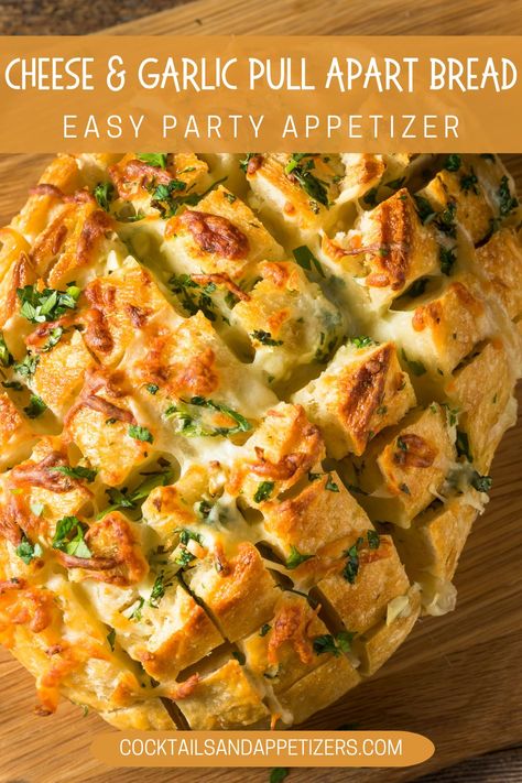 This easy to make cheesy garlic pull apart bread is ready in under 25 minutes. This savory appetizer is the perfect appetizer for holiday parties and tailgating party food. Cheese, garlic and herbs in a french bread, scored and full of melty cheese delicious goodness! Delicious as a game day snack, appetizer or along with dinner! Crusty Bread Appetizers, Cheesey Garlic Monkey Bread, Party Bread Pull Apart, French Bread With Cheese, Pull Apart Cheesy Garlic Bread Easy, Garlic Bread Twists Recipe, Cheese And Garlic Pull Apart Bread, Garlic Bread For A Crowd Parties, French Bread Appetizers Parties