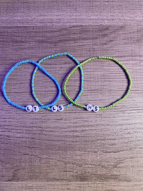 Harry Styles , Louis Tomlinson, and Larry Stylinson initial bracelets Friendship Bracelets Initials, Larry Stylinson Bracelet, Louis Tomlinson Beaded Bracelets, Larry Bracelet, Louis Tomlinson Bracelet Ideas, Louis Tomlinson Bracelet, Harry Styles Bracelets, Louis Tomlinson Harry Styles, Concert Bracelets