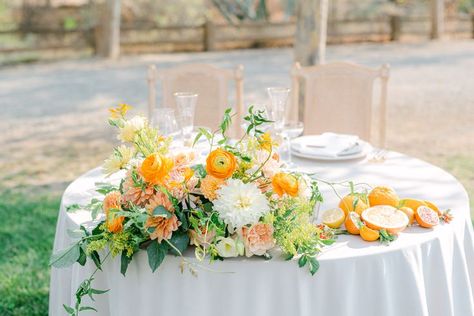 A sweetheart table filled with citrus and local flowers. Venue Field and Pond. #citruswedding #sweethearttable #yellowwedding #orangewedding #summerwedding #sacramentoflorist #sacramentowedding Sweetheart Table Wildflowers, Pond Photography, Sweetheart Table Flowers, Table Swag, Local Flowers, Spring Wedding Color Palette, Citrus Wedding, Head Table Wedding, Sweetheart Table Wedding