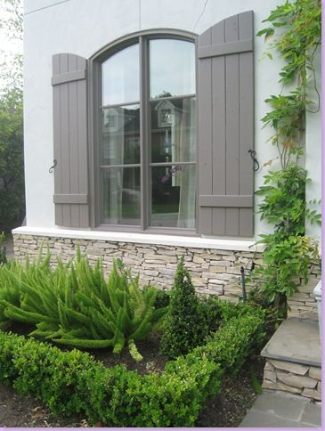 Sally Wheat, boxwoods, foxtail fern, gray shutters, stone French Country Shutters, Grey Shutters, Country Shutters, German Smear, Wood Gates, French Country Exterior, Rustic Shutters, Shutter Colors, Cedar Shutters