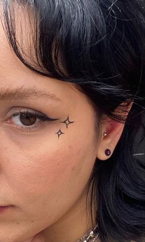 Sagittarius Face Tattoo, Small Cheek Tattoo, Sparkle Face Tattoo, Nose Tattoo Ideas, Red Face Tattoo, Cute Face Tattoos, Cheek Tattoo, Small Face Tattoos, Nose Tattoo