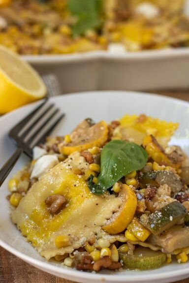 These Trader Joe’s sweet corn ravioli are paired with a browned butter lemon sauce, summer squash, mozzarella and basil for a quick and easy summer dinner.This recipe is made with Trader Joe's sweet corn ravioli with burrata & basil but you could use regular cheese ravioli as well!Aside from these corn ravioli being delicious, it’s a quick and easy vegetarian dinner, perfect for summer. Light, cheesy, buttery and a little crunchy…all the right things. If you’re not watching c… Sweet Corn Ravioli, Corn Ravioli, Butter Lemon Sauce, Greek Lemon Rice Soup, Brown Butter Sage Sauce, Lemon Orzo Salad, Easy Summer Dinner, Lemon Salad, Brown Butter Sauce