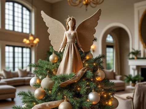 A handmade burlap angel tree topper with soft neutral tones and elegant hand-sewn details, perched on a Christmas tree adorned with golden ornaments and rustic ribbon. Rustic Christmas Tree Toppers, Burlap Angel, Angel Topper, Cozy Holiday Decor, Burlap Stockings, Angel Tree Topper, Farmhouse Holiday, Angel Tree, Rustic Holiday