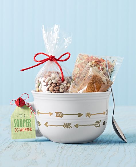 Transform a budget-friendly ceramic mug or bowl into a charming Christmas gift using paint markers. Once personalized fill the cup with packages of dry soup mixes or other wintry treats. Add a clever gift tag to top off this darling DIY present. #diychristmasgift #diygift #homemadechristmasgifts #easydiygifts #bhg Soup Mixes For Gifts, Soup Gift Basket Ideas, Mixes For Gifts, Soup Gift Basket, Soup Gifts, Christmas Soup, Dry Soup Mix, Homemade Food Gifts, Christmas Bowl