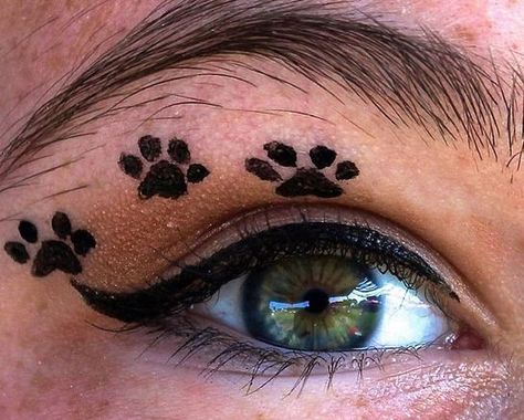 Here is a simple cute paw print idea. I used Elf's Liquid liner and Maybelline's New York brand brown eye shadow.  (Now you can use any eye shadow thats just what I used.)  #makeup #animal #puppy #pawprints #liquidliner #cute #eye Paw Print Makeup, Dog Nose Makeup, Animal Eye Makeup, Dog Makeup Women, Animal Eyeliner, Dog Halloween Makeup, Paw Print Face Paint, Dog Makeup Halloween, Animal Inspired Makeup