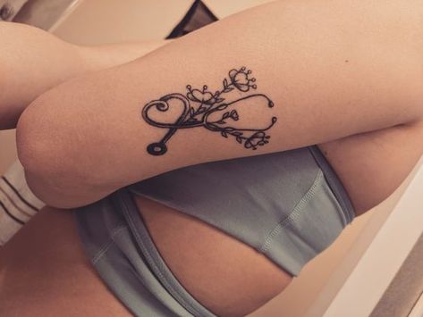 Stethoscope Tattoo Pediatric Nursing Tattoos, Stethescope Tattoo Simple, Stethoscope With Flowers Tattoo, Nurse Flower Tattoo, Floral Stethoscope Tattoo, Medical Field Tattoo Ideas, Pediatric Nurse Tattoo, Cna Tattoos For Women, Nurse Tattoo Ideas Sleeve