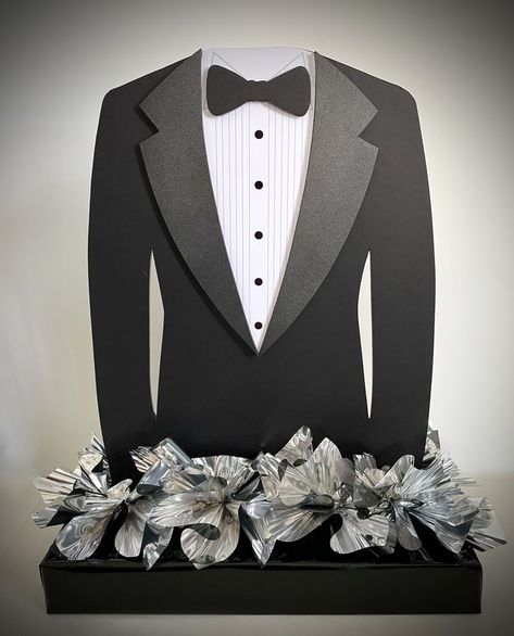 Foamcore tux with layers for a party centerpiece. Tuxedo Theme Party Centerpieces, Bow Tie Centerpieces For Men, Bow Tie Birthday Party Ideas, Centerpieces For A Mans Birthday Party, Tuxedo Backdrop Diy, Male 60th Birthday Party Centerpieces, Tuxedo Theme Birthday Party, Tuxedo Party Decorations, Tuxedo Centerpieces For Men