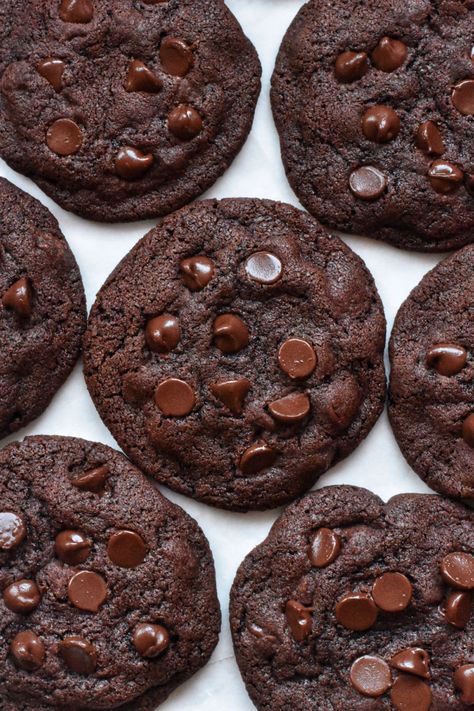 Cookies spread out on a sheet of baking paper. Photo taken from
Above. Chocolate Choc Chip Cookies, Double Choc Chip Cookies, Choc Chip Recipes, Baking Envy, Ultimate Chocolate Chip Cookies Recipe, Choc Chip Cookie Recipe, Double Chocolate Chip Cookie Recipe, Double Chocolate Chip Cookie, Ultimate Chocolate Chip Cookie