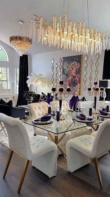 Wendy Millward on Instagram: "Happy Monday My Friends! Today I am sharing my newest living & dining room restyle with a pop of purple! Please comment “link” for a link to my website. I hope you have a wonderful day!💜🖤💜 .  Wall Canvas & Vertical Metal Wall Decor: @burlingtondeals  Metal Wall Mirrors: @homarycom  Pillows: Comment “link” Dining Table & Chairs: Comment “link” Accent Chairs: Comment “link” Chandeliers: Link in Stories Today . . . . #modernglam #diningroom #livingroominspiration #livingroomdetails #diningroomdesign #popofblack #coffeetablestyling #mixedmetals #diningtable #diningtabledecor #golddecor #interiordetails #decor #blackgolddecor #goldaccents #glamdecor #designinspo #glam #glamstyling #glamhome #homeinspo #throwpillows #purpledecor #pillowcovers" Glam Dining Room Decor, Modern Glam Dining Room, Glam Living Rooms, Black Gold Decor, Black Dining Room Table, Burgundy Decor, Glam Dining Room, Black Room Decor, Gold Dining Room