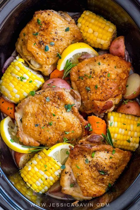 Slow cooker chicken thighs served with hearty vegetables is a complete meal made easy! Tender pieces of chicken, potatoes, carrots, and corn, all simmered in a lemon garlic herb sauce. #slowcooker #crockpot #chickenrecipes #chickenthighs Slow Cooker Chicken Thighs, Country Boil, Chicken Corn, Pot Recipes Easy, Summer Meals, Summer Meal, Foil Packets, Crockpot Dishes, Awesome Recipes