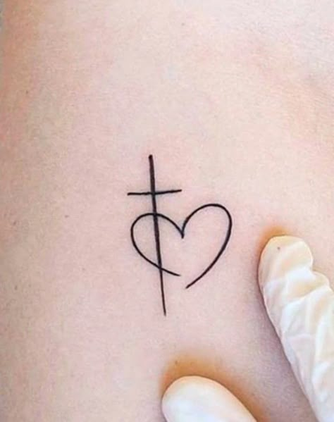 Small Tattoos Side Wrist, Cross With Heart Tattoo On Wrist, Cross With Heart Tattoos For Women, Fe Tattoos For Women, Cute Christian Tattoos For Women, Simple Religious Tattoos, Cross With Heart Tattoo, Heart With Cross Tattoo, Wrist Cross Tattoos For Women