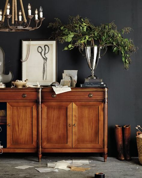 Dark gray sets of a gorgeous honey brown cabinet from Ballard Designs Brown Wood Bed, Dark Grey Living Room, Dark Brown Walls, Kendall Charcoal, Dark Brown Cabinets, Brown Living Room Decor, Paint For Kitchen Walls, Apartment Decorating Living, Dark Paint Colors