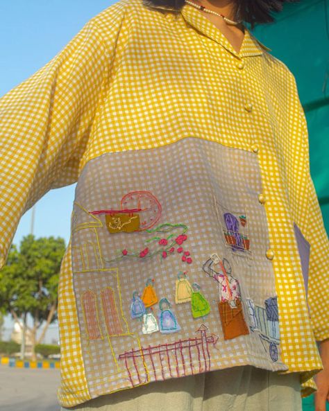 The "Yellow Story" button down from Sundaze collection: The shirt is crafted from recycled pure cotton, highlighting a commitment to sustainability. It features an intricate embroidered organza patch and a silk pocket, both repurposed from recycled handkerchief. The detailed embroidery is not just decorative; it beautifully depicts scenes from everyday local life, capturing the essence and culture of the community. This blend of recycled materials and storytelling through embroidery makes th... Yellow Unstitched Embroidered Fabric For Festivals, Yellow Embroidered Cotton Shirt, Yellow Cotton Patchwork Shirt, Traditional Multicolor Embroidered Cotton T-shirt, Cotton Patchwork Button-up Shirt, Detailed Embroidery, Embroidered Organza, Shirt Embroidery, The Shirt