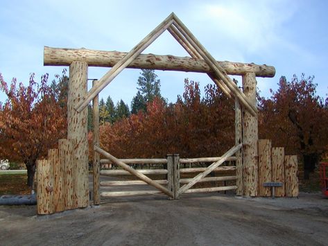 Log Home Packages | MontanaLogHomes.com | Kalispell, MT : Montana Log Homes Ranch Gates Entrance Ideas, Granny Pad, Farm Gates Entrance, Ranch Entrance Ideas, Log Fence, Ranch Gates, Ranch Ideas, Entry Gate, Log Wall