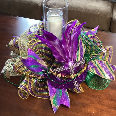 MARDI GRAS Don't hide your crazy, put it on parade. This handmade candle surround centerpiece would be a great Mardi Gras table setting idea and is made using gold, green, and purple deco mesh with an assortment of green, gold, and purple ribbons and a variety of green, gold, or purple masks, depending on availability  (message me if you would like a certain color); there may also be slight differences in the beading. Can be used on end tables, dinning tables, buffet tables, sofa tables, console Mardi Gras Party Decorations, Mardi Gras Decor, Mardi Gras Wedding, Mardi Gras Centerpieces, Mardi Gras Crafts, Pet Wreath, Mardi Gra, Mardi Gras Outfits, Mardi Gras Wreath