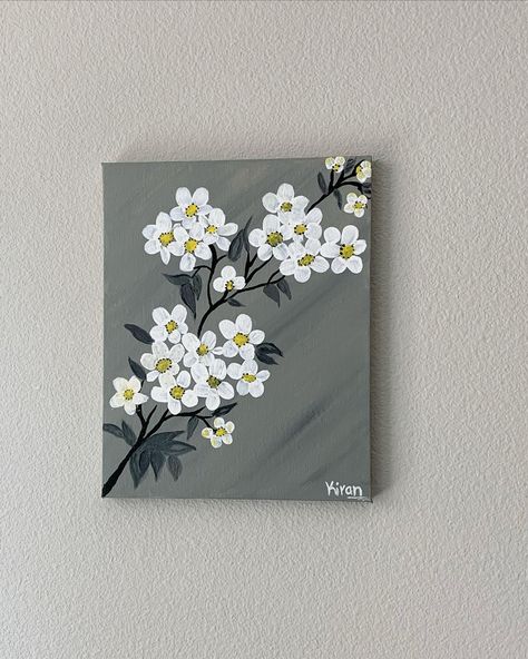 white flower with stem with smear of grey in background brings out beautiful look on this acrylic painting on canvas. Acrylic Paintings Floral, Painting On Grey Background, White Flower Canvas Painting, White Painting Ideas On Canvas, Simple Art Painting Ideas Beautiful, Flower Easy Painting Simple, Simple Canvas Art Painting, Canvas Painting Background Ideas Easy Diy, Grey Acrylic Painting Ideas