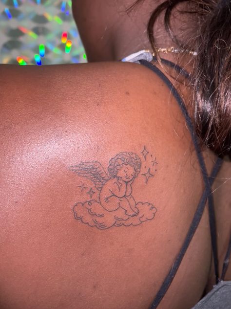 Curly Hair Angel Tattoo, Angel With Afro Tattoo, Black Angel Tattoo African Americans, Black Cupid Tattoo, Angel Tattoo Black Women, African American Art Tattoo, Black Baby Angel Tattoo, Whispering Angel Tattoo, Angel Inspired Tattoo