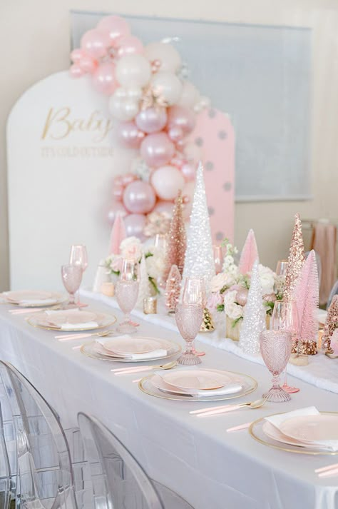 Step into a winter wonderland fit for a little princess! 🎀❄ Our 'Baby, It's Cold Outside' themed baby shower for a baby girl is a dream come true. Imagine pink Christmas trees glistening in faux snow, surrounded by fresh florals that add a touch of elegance. Our event is a vision of loveliness, with larger-than-life pink Christmas trees and enchanting balloon backdrops that set the stage for a magical celebration. Pink Christmas 1st Birthday, Pink Winter Wonderland 1st Birthday, Pink Winter Birthday Party, Pink And White Winter Wonderland, Sweet One Christmas Birthday, Winter Wonderland Pink Baby Shower Ideas, Pink Winter Wonderland Party Decorations, Oh Baby Its Cold Outside Shower Ideas, Winter Wonderland Baby Shower Pink