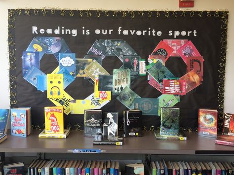 #sports #Olympics2016 #Olympics #bulletinboard #display #library Olympics School Theme, Olympic Bulletin Board Ideas, Olympic Themed Bulletin Board, Olympics Classroom Theme, Olympic Classroom Door, Olympic Library Display, Library Olympics, Olympic Bulletin Board, Library Marketing