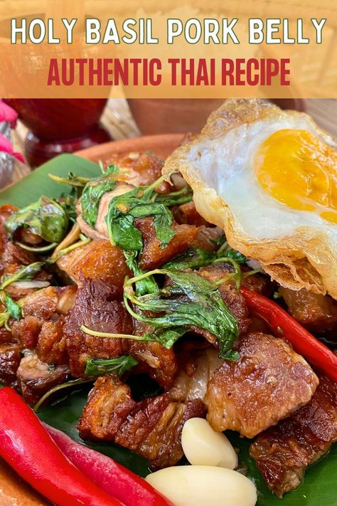 Stir fried basil with crispy pork belly, garlic, red chilies, and a deep fried egg. Vietnamese Pork Belly And Eggs, Vietnamese Crispy Pork Belly, Thai Basil Pork Stir Fry, Asian Braised Pork Belly, Crispy Pork Belly Ramen, Basil Pork, Thai Basil Pork, Deep Fried Egg, Fried Basil