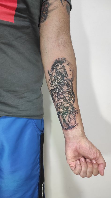 190+ Gladiator Tattoos Inspired From Medieval Warriors (2022) - TattoosBoyGirl Spartan Warrior Tattoo For Men Forearm, Spartan Forearm Tattoo, Spartan Warrior Tattoo For Men, 300 Spartans Tattoo Ideas, Warrior Tattoos For Men, Gladiator Tattoos, Spartan Tattoos, Gladiator Tattoo, Soldier Tattoo