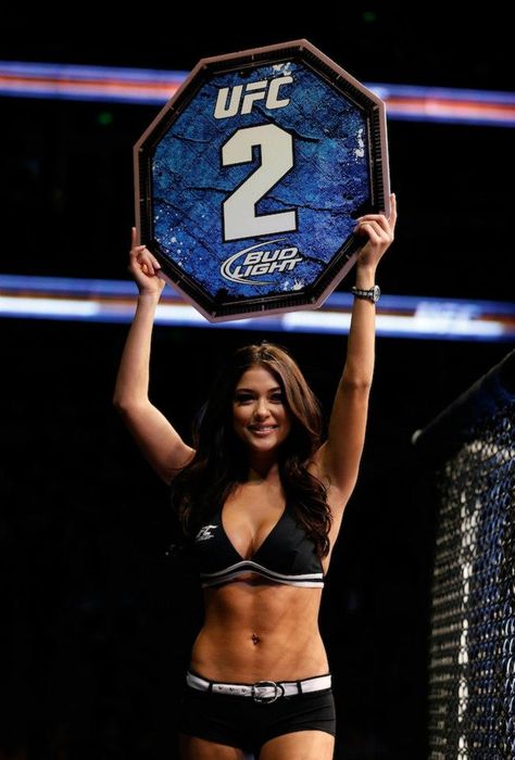 UFC Octagon Girl Arianny Celeste introduces a round during UFC 157 at Honda Center on February 23, 2013 in Anaheim, California. Ufc Octagon, Octagon Girls, Anaheim California, Anaheim, Ufc, California, Women's Top, Beauty