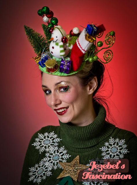 Skip the ugly Christmas sweater and stand out wearing this gaudy fascinator with, Frosty, a stocking filled with gifts and so much more reminiscent of your childhood Christmas! Please note frosty and the whimsical pieces in the back will be a little different than what is pictured :) Xmas Hats Ideas, Crazy Christmas Hat Diy, Ugly Christmas Hat Ideas, Christmas Hats Ideas Diy, Crazy Hat Day Ideas For Adults, Crazy Christmas Hat, Christmas Hats Ideas, Christmas Fascinator, Diy Christmas Hats