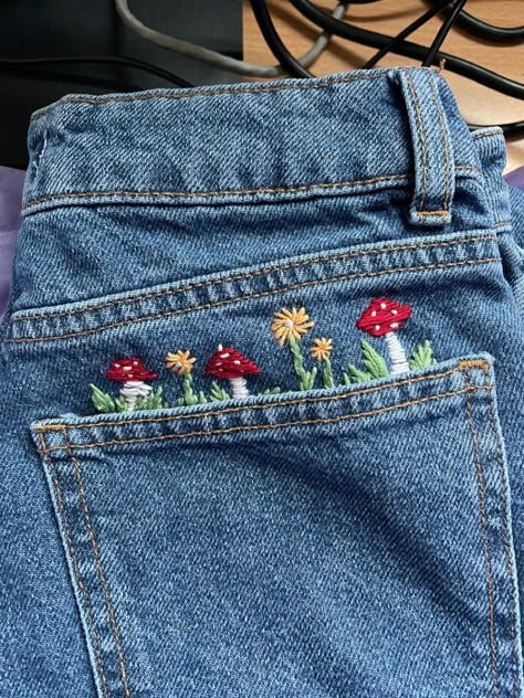 Embroidered Mushrooms On Jeans, Mushroom Embroidery On Jeans, Floral Embroidery On Jeans, Mushroom Embroidery Jeans, Jean Jacket Embroidery Ideas, Jeans Embroidery Ideas, Hand Embroidery Jeans, Mushroom Jeans, Cottage Core Embroidery