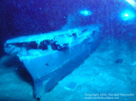 The USS Yorktown CV-5 was sunk at the battle of Midway in June 1942 and sits upright on the sea floor in the Pacific Ocean over three miles down. Deeper than the Titanic in the Atlantic Ocean. The Yorktown was found by Robert Ballard in 1998 who wrote a book about finding the carrier. Battle Of Midway, Underwater Hotel, Uss Yorktown, Uss Iowa, Model Diorama, Model Warships, Scale Model Ships, Wrote A Book, Navy Day