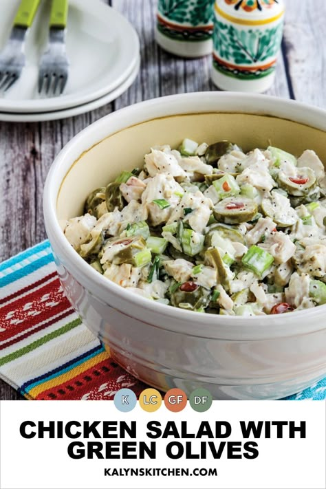 Pinterest image showing Chicken Salad with Green Olives in round glass bowl on a multi-colored striped napkin. Chicken Salad With Green Olives, Olive Chicken Salad, Chicken Salad With Olives, Salads With Green Olives, Recipes Using Green Olives, Recipes With Green Olives, Green Olives Recipes, Green Olive Recipes, Foods To Lower Triglycerides