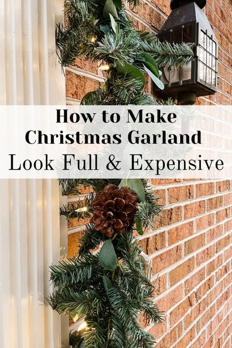 Christmas Garland with eucalyptus and pine cones Garland Garage Door, Bannister Ideas Christmas, Christmas Door Arch Garland, Garland On Garage Door, Garage Door Christmas Garland, Rail Garland Christmas, Prelit Garland Around Front Door, Xmas Garland Around Front Door, Christmas Garland Over Front Door