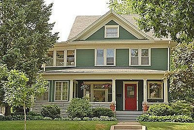 Green house, red door, great curb appeal. Red And Green House Exterior, Green Siding With Red Brick, Red Brick With Green Trim, Green House With Red Door, Green House Red Trim Exterior Paint, Green House Red Door, Green Exterior Paint With Red Brick, Green Painted House, Front Door Curb Appeal