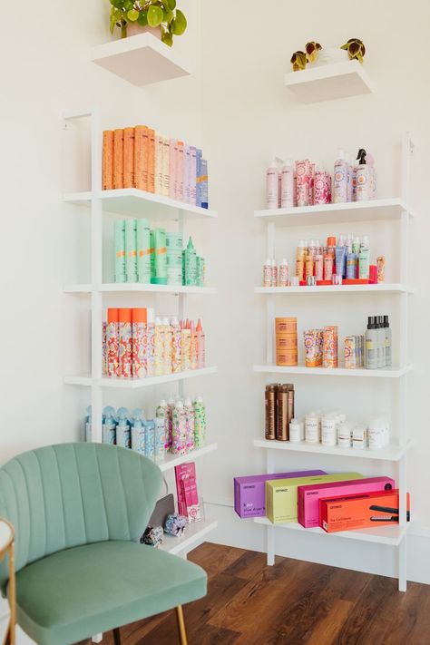 Pastel Salon Interior, Best Hair Salon Design, Quirky Salon Interior Design, Salon Product Wall Display Ideas, Hair Salon Products Display, Salon Interior Color Ideas, Fun Hair Salon Decor, Salon Color Processing Area, Hair Salon And Boutique Ideas