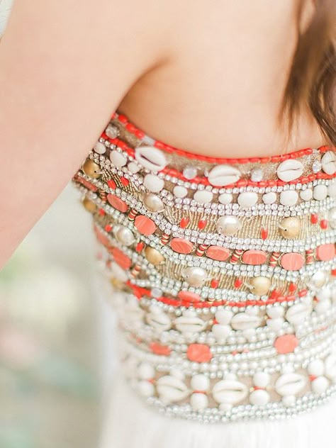 embellished wedding gown - photo by Trini Mai Photography http://ruffledblog.com/vibrant-summer-wedding-inspiration Cowrie Shell Dress Design, Shell Blouse Indian, Shell Work On Dress, Shell Design Dress, Seashell Outfit, Shell Jwellery Haldi, Seashells Embroidery, Embroidered Seashell, India Wedding Dress