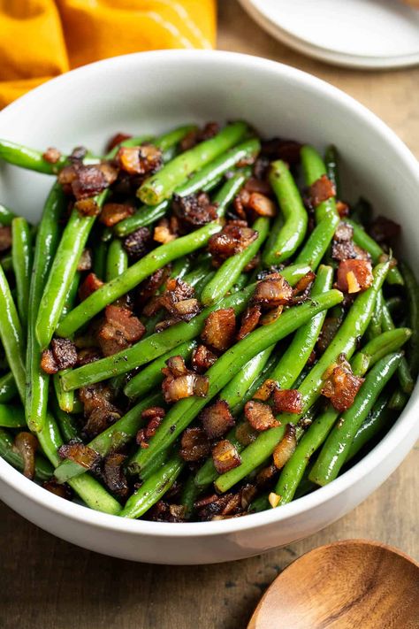 Green beans with bacon and onion are PACKED with flavor, with perfect crisp-tender green beans every time. This family-favorite side dish comes together with simple ingredients and fits any menu, whether a weeknight dinner or a holiday meal. Green Beans Bacon Onion, Cook Fresh Green Beans, Recipe For Green Beans, Pan Green Beans, Bacon Bits Recipes, Marinated Green Beans, Bacon Side Dishes, Bacon Green Beans, Easy Green Bean Recipes