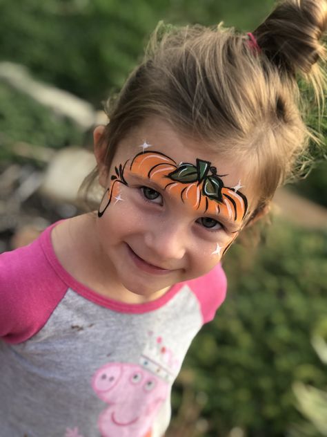 Simple forehead pumpkin design #justfaceitwichita #autumn #halloween #facepaint #pumpkin #kansas #wichita #ict Simple Pumpkin Face Paint, Pumpkin Face Paint Ideas, Easy Halloween Face Painting For Kids, Pumpkin Facepainting Ideas, Pumpkin Face Paint For Kids, Halloween Facepainting Simple, Cute Pumpkin Faces Painted, Pumpkin Face Painting Ideas, Face Paint Pumpkin